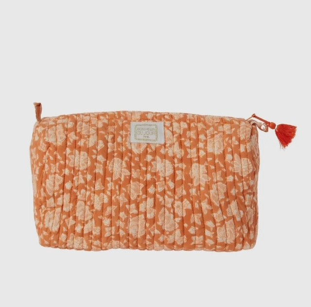 Julegavesæt – “Til hende på farten” Toilettaske Petunia Rose & Armbånd i varme farver