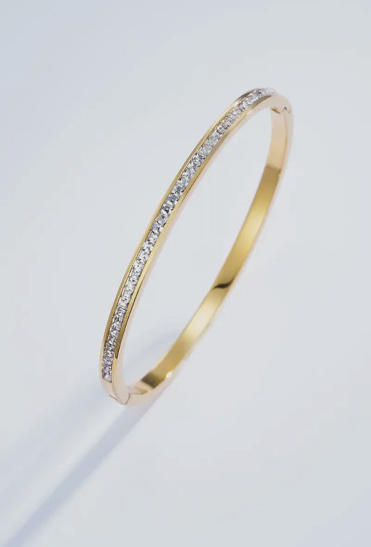 Guldfarvet armbånd med rhinestones