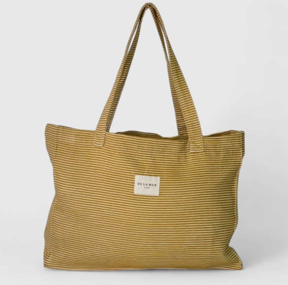 Tote bag i polstret stof – sennep striber (Mellem) | De La Mur